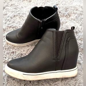 Woman’s wedge, casual shoes, size 7 1/2